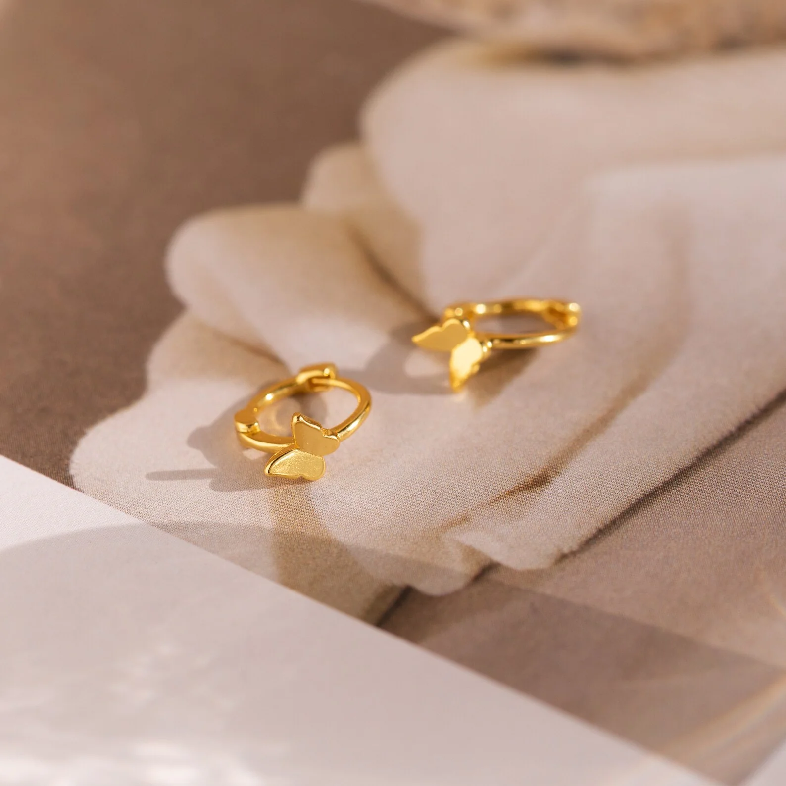 Butterfly Cartilage Mini Huggies in 18K Gold