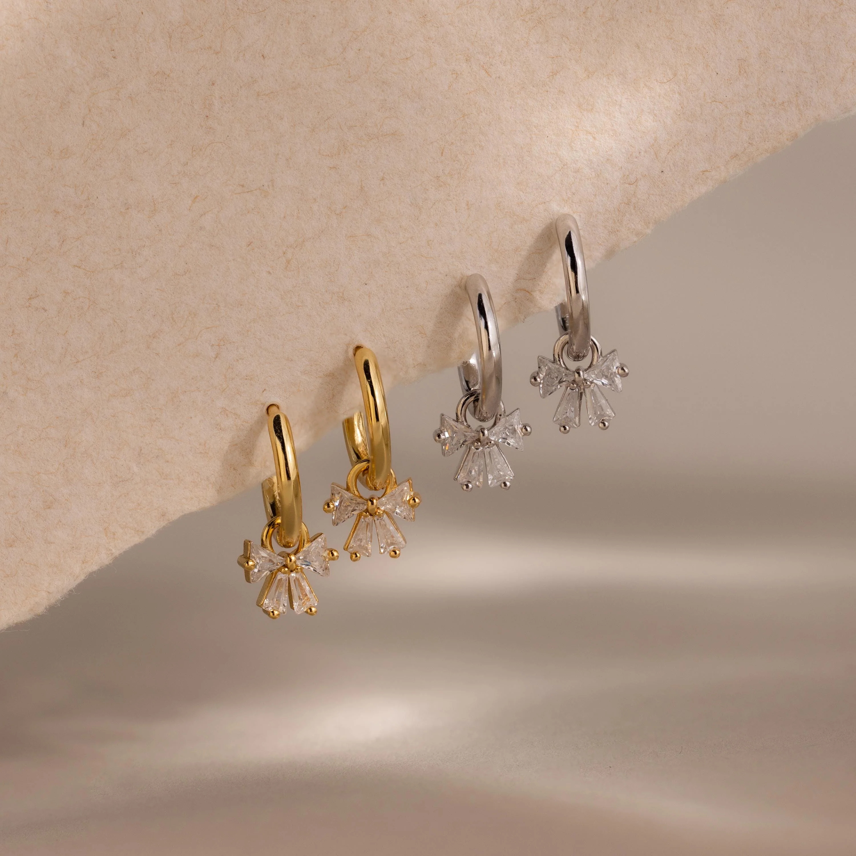 Diamond Bow Hoops in Silver