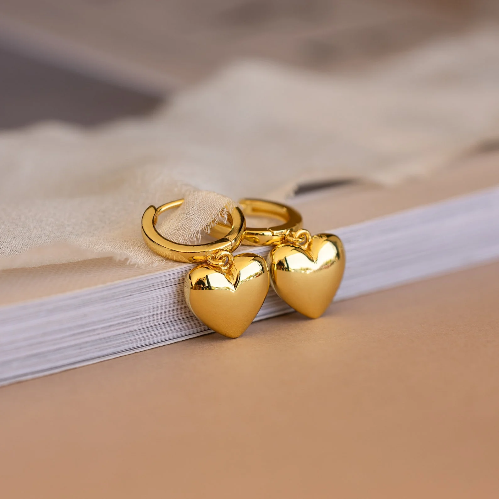 Puff Heart Charm Huggies in Silver - Image 5